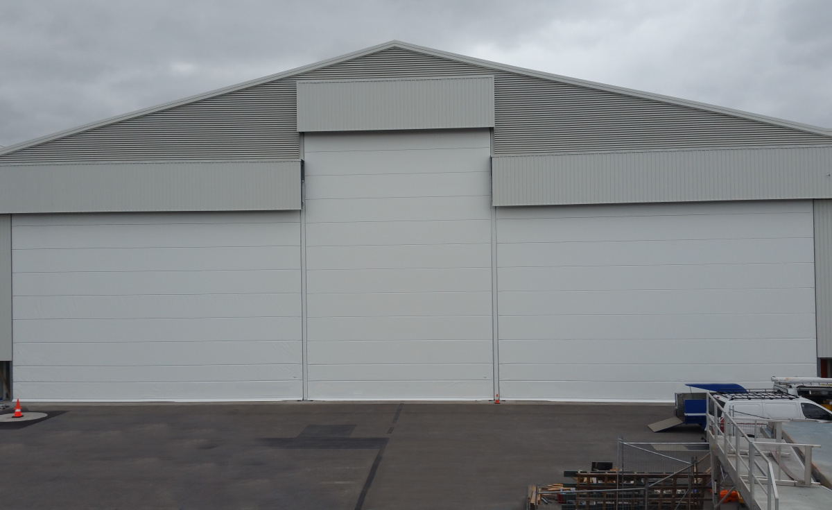 According to Champion Door, all components of the new door are pre-assembled at the factory, requiring no welding and cutting on site. This results in a minimal assembly time, as well as a reduced number in the number of technicians required for installation. According to Champion Door, all components of the new door are pre-assembled at the factory, requiring no welding and cutting on site. This results in a minimal assembly time, as well as a reduced number in the number of technicians required for installation.