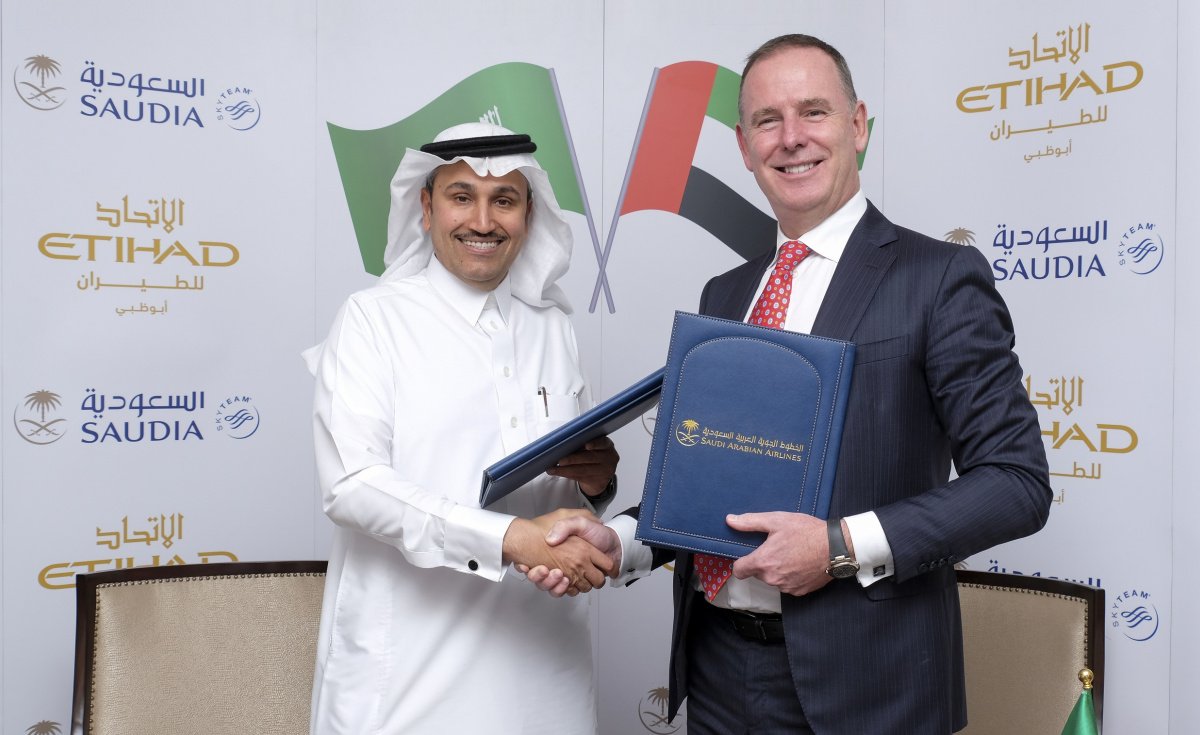 The partnership agreement was signed by HE Eng. Saleh bin Naser Al Jasser, Director General Saudi Arabian Airlines, and Tony Douglas, Group CEO of Etihad Aviation Group. The partnership agreement was signed by HE Eng. Saleh bin Naser Al Jasser, Director General Saudi Arabian Airlines, and Tony Douglas, Group CEO of Etihad Aviation Group.