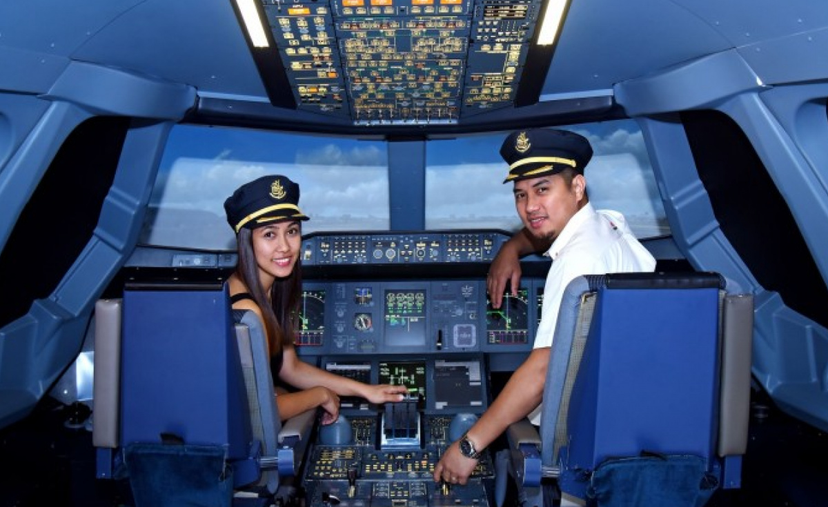 Emirates' A380 simulator allows members of the public to try their hand at flying one of its superjumbos in Dubai Mall Emirates' A380 simulator allows members of the public to try their hand at flying one of its superjumbos in Dubai Mall