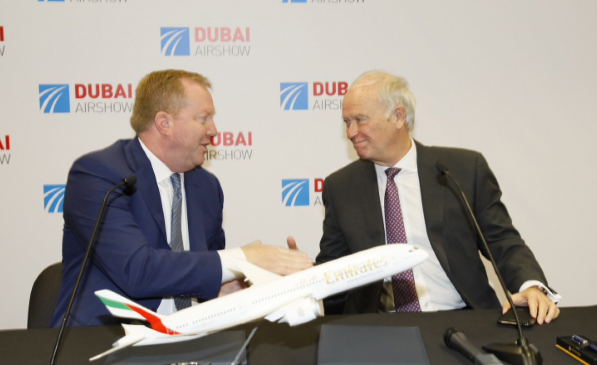 Stanley Deal, president of Boeing Commercial Airplanes and Sir Tim Clark, president of Emirates airline, shake on a deal for 30 787-9s. Stanley Deal, president of Boeing Commercial Airplanes and Sir Tim Clark, president of Emirates airline, shake on a deal for 30 787-9s.
