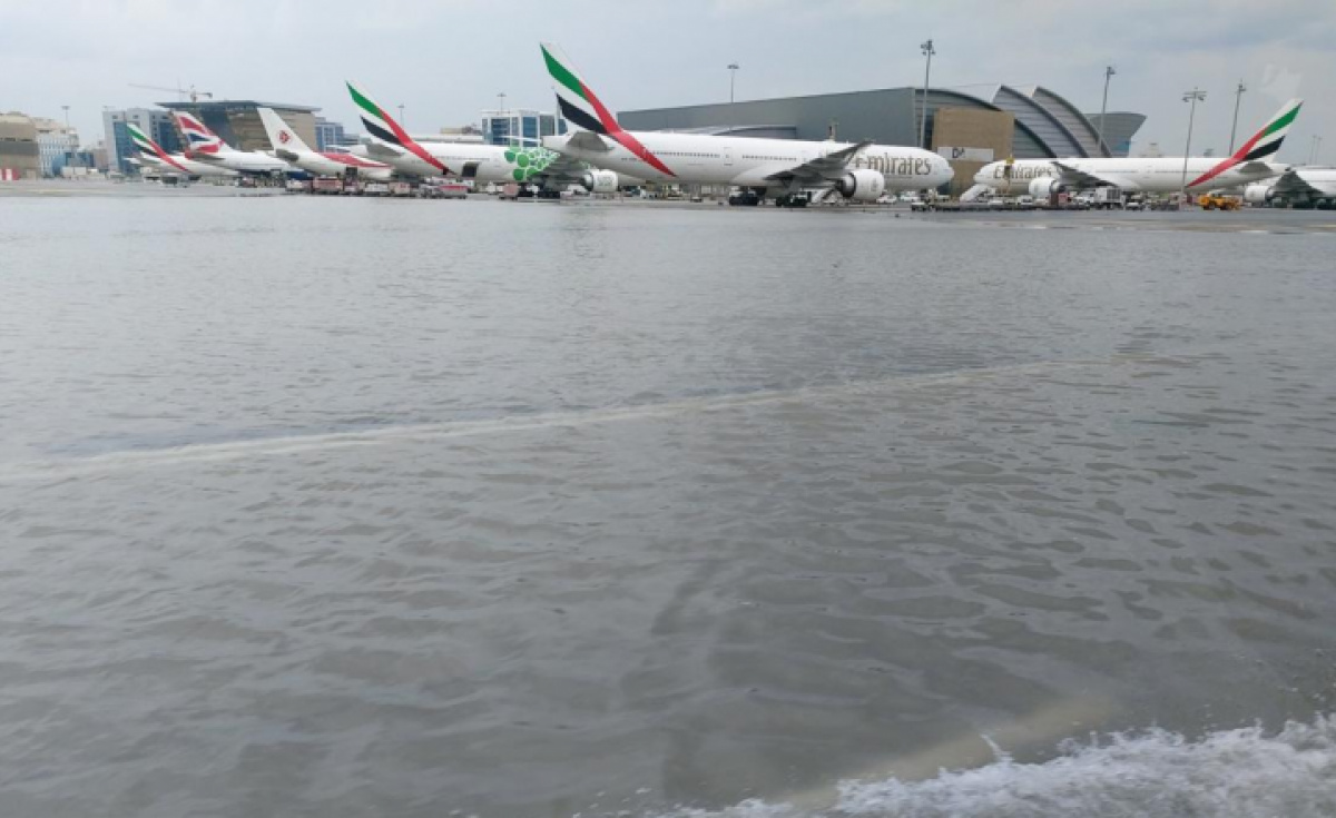 Parts of DXB's runway area were pictured submerged underwater. Parts of DXB's runway area were pictured submerged underwater.